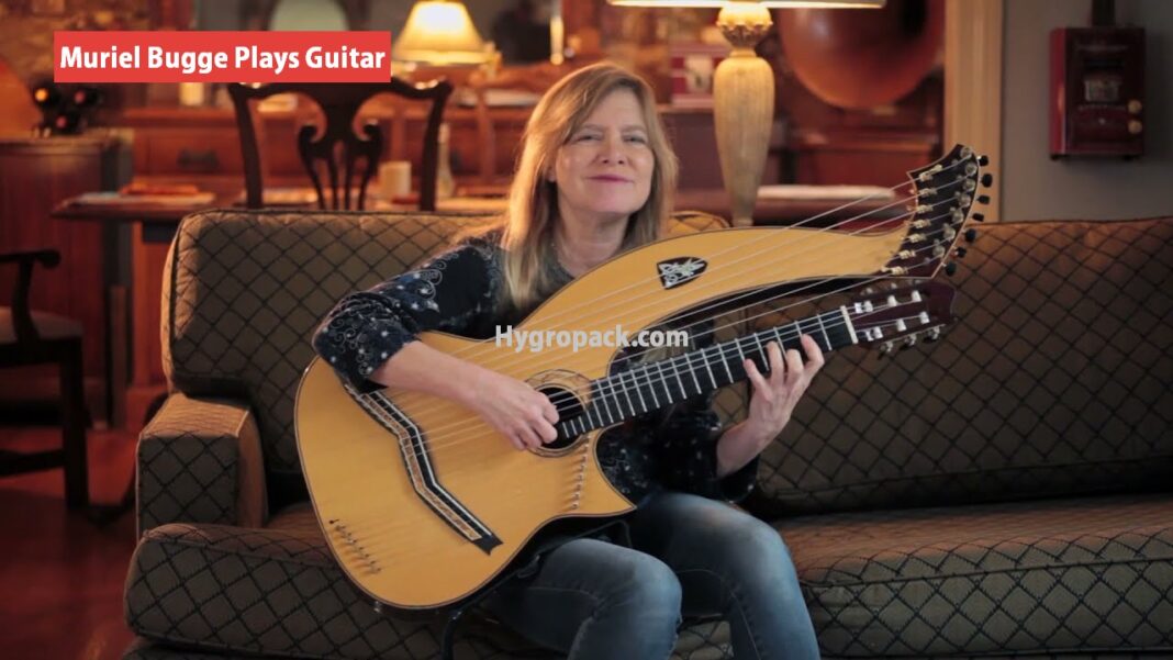 muriel bugge plays guitar